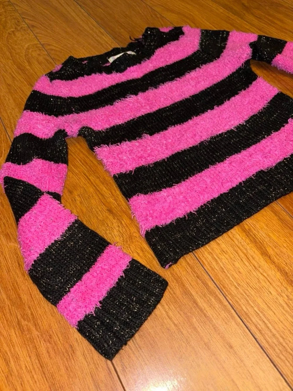 black and pink striped sweater